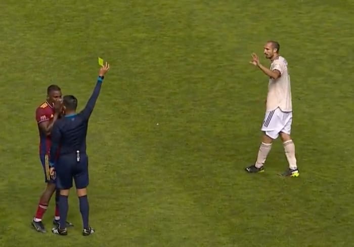 Giorgio Chiellini (right) pictured receiving the first yellow card of his MLS career during LAFC's 4-1 win at Real Salt Lake in August 2022